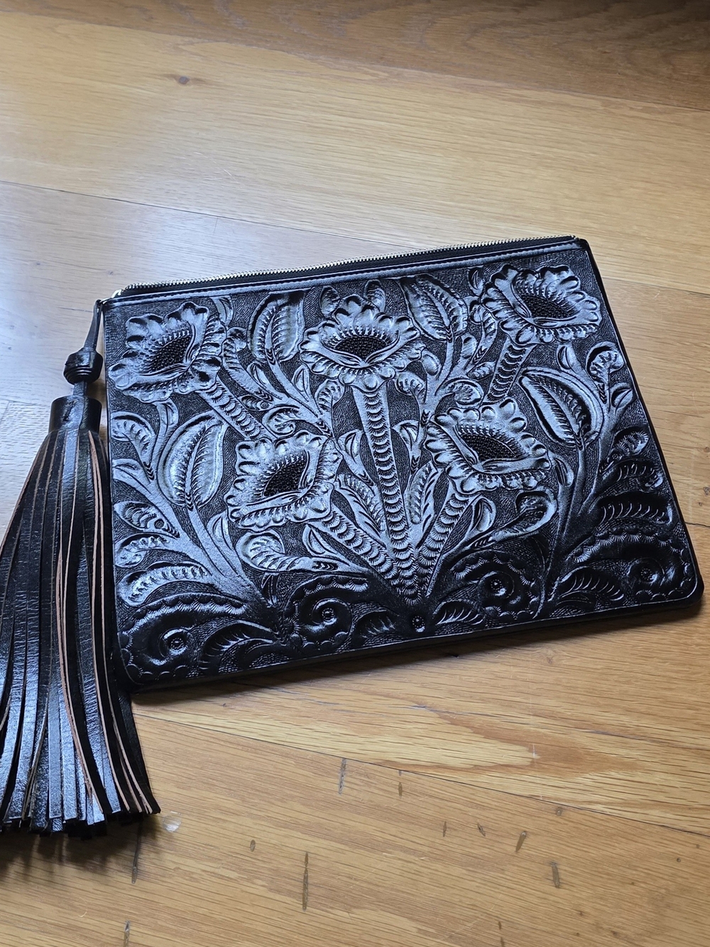 Women’s Black Embossed Leather Clutch with Tassel